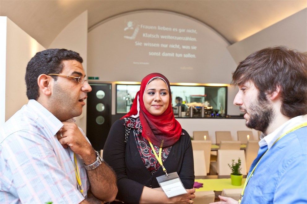 International researchers exchanging their ideas