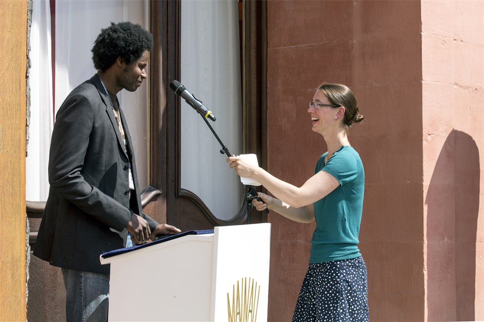 Young researcher Emalick Njie about to deliver his closing farewell address.