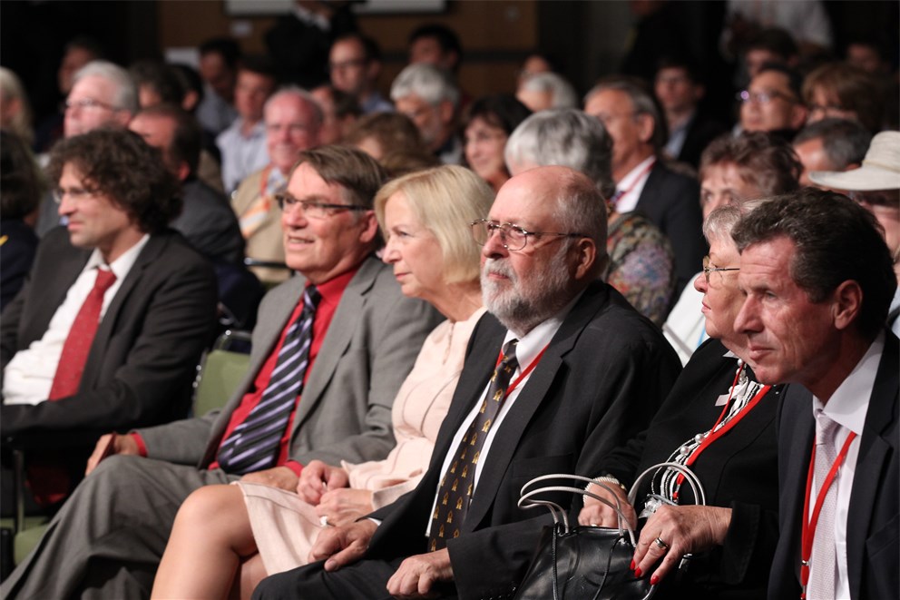 Gunnar Stålsett, Johanna Wanka and Klaus Tschira attending the Opening Ceremony.