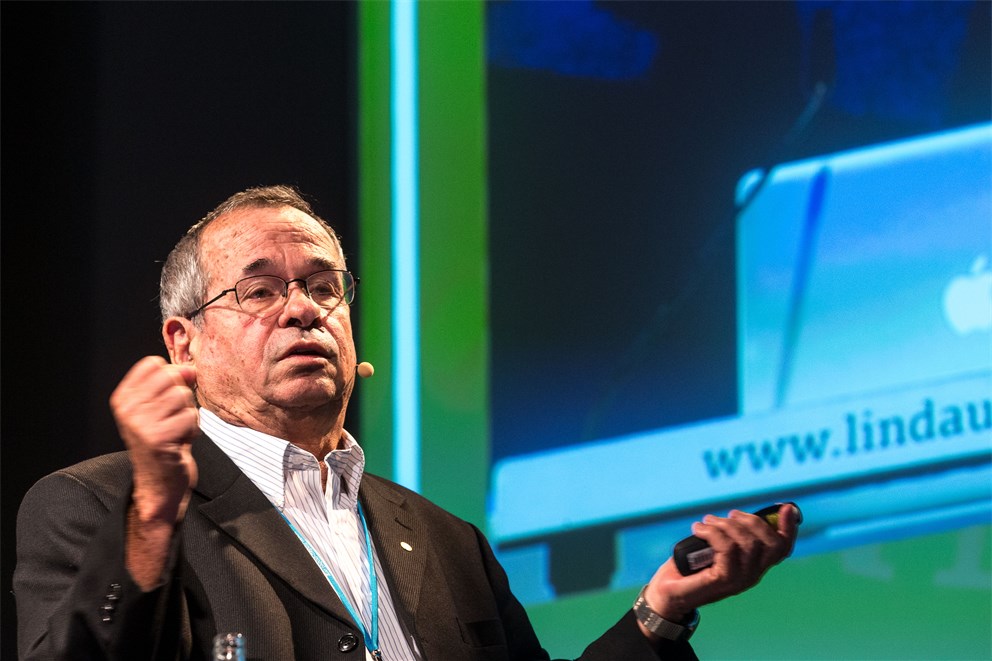 Bruce Beutler holding his lecture "Deciphering Immunity by Making It Fail" at the 64th Meeting.