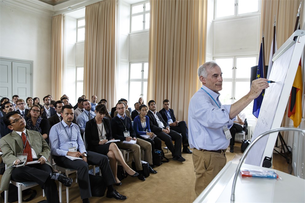 Christopher A. Sims holding a discussion session.