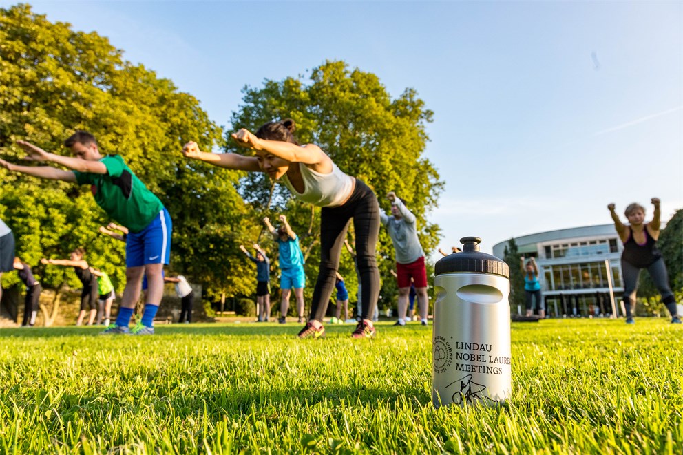 Young scientists taking part in a morning workout
