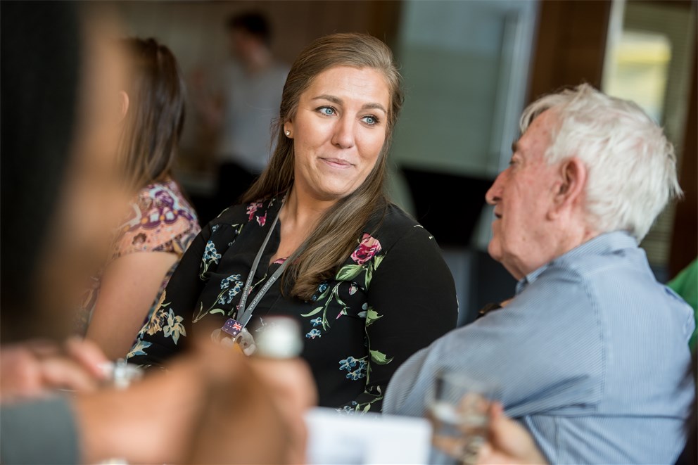 Peter Doherty talking to a young scientist at the 68th Lindau Nobel Laureate Meeting