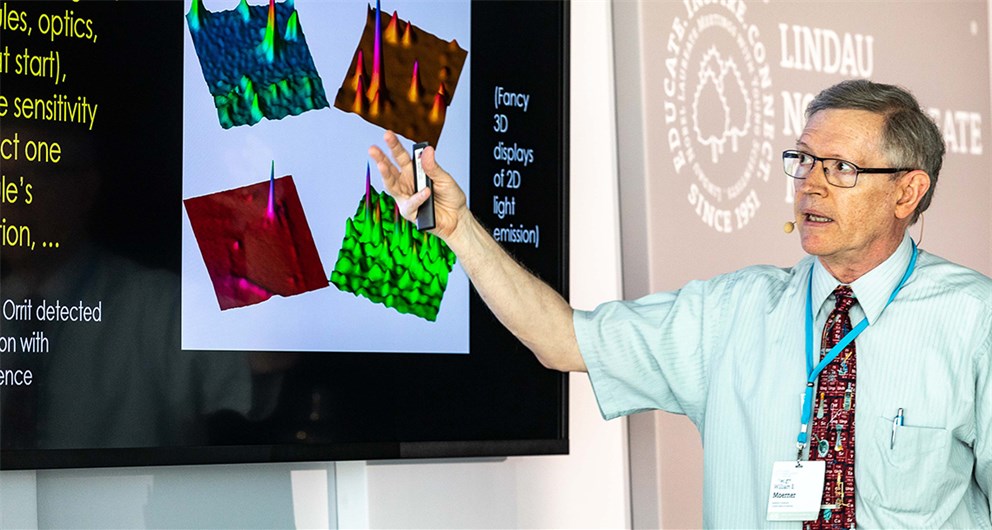 W. E. Moerner delivering his Agora Talk "What Can You Learn From Single Molecules, Even When Trapped Without Optical Forces?"