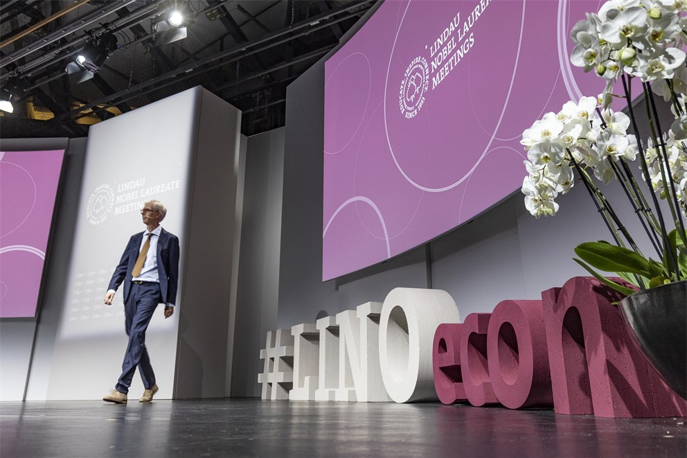 Adam Smith moderating the Opening Ceremony.